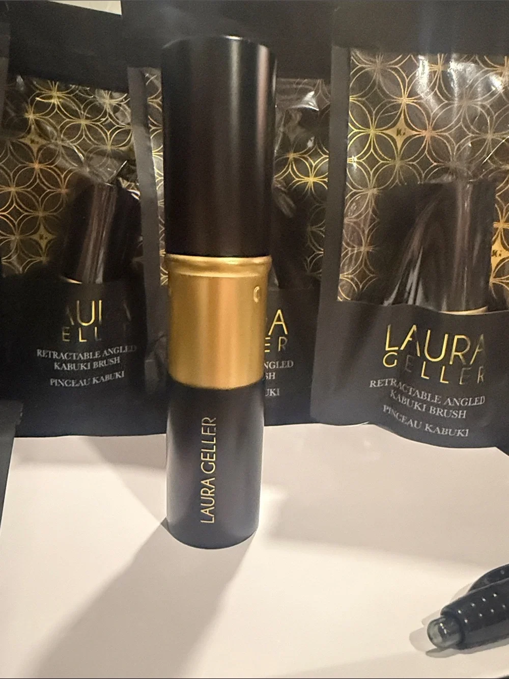 Laura Geller Black and Gold Retractable Angled Kabuki Brush brand new